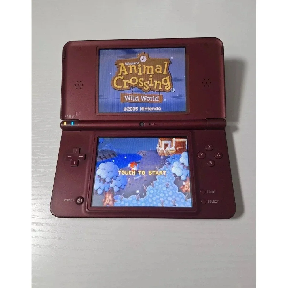 Nintendo DSI xl with three game bundle